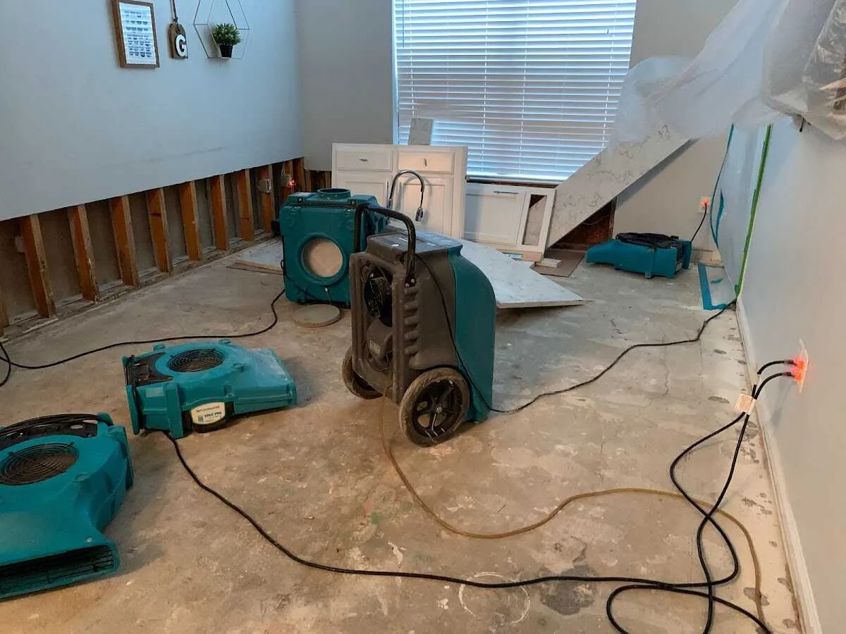 Dehumidifier in flood-cut room for Water Damage Restoration in Kendall West